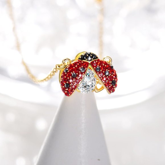 Swarovski's beating heart ladybug necklace pendant is exquisite and sparkles in - Picture 2 of 5